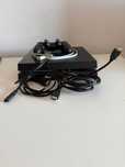 PS4 com um comando e um jogo