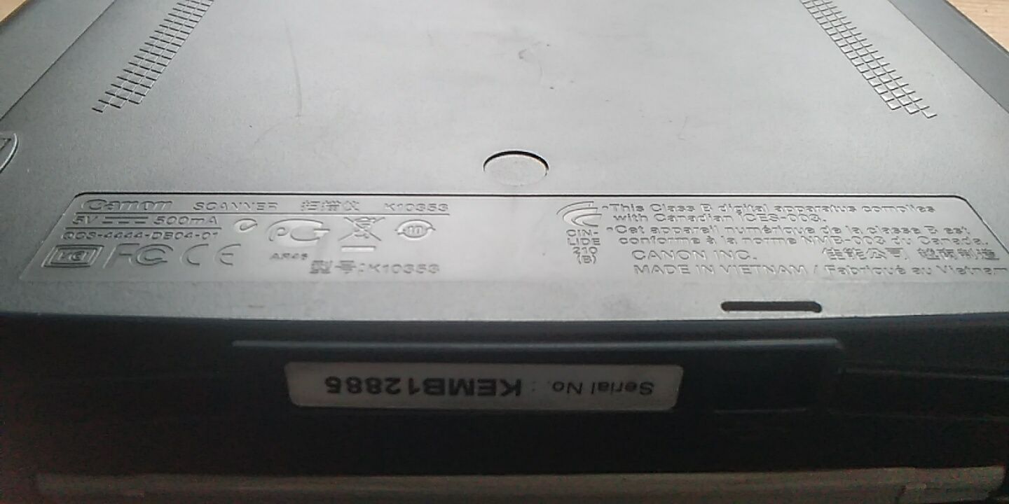сканер бумаги  CanonLIDE 210