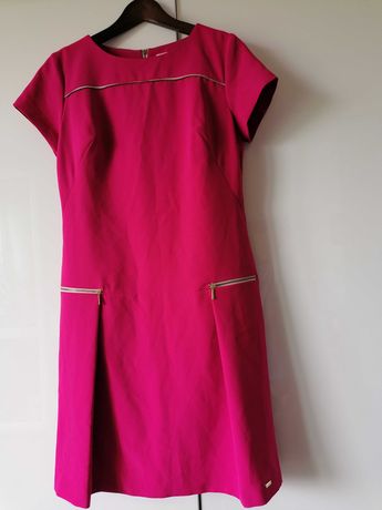 Nowa różowa elegancka sukienka 42 trapezowa zamki z elastanem Tanio