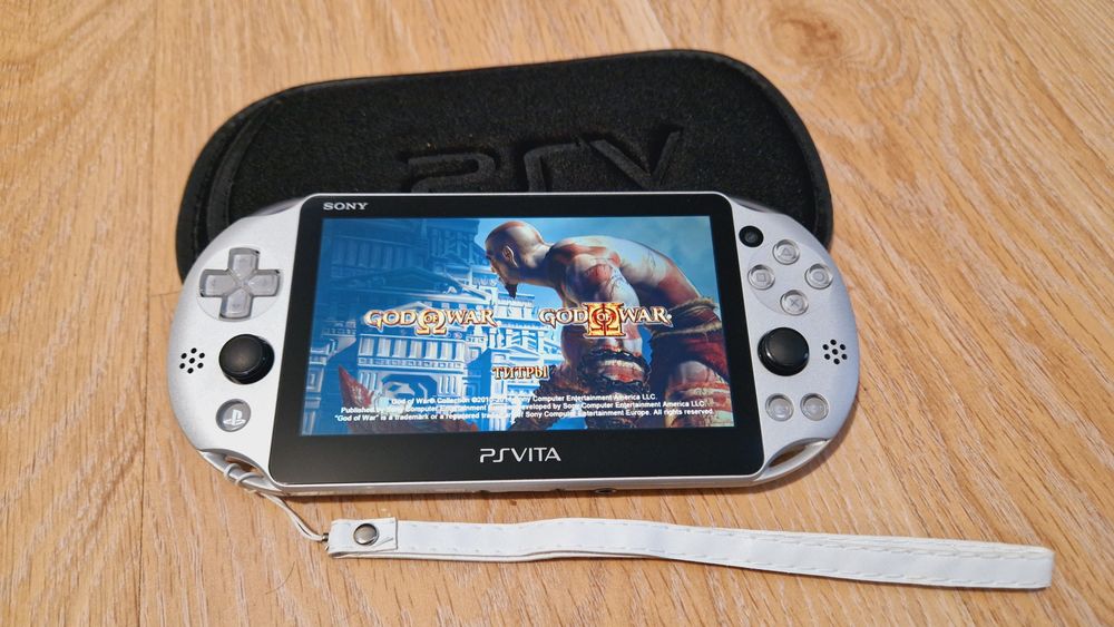 Серебристая Ps Vita Slim 64гиг с играми 60шт