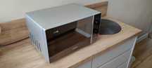 Kuchenka mikrofalowa WHIRLPOOL MWP 101 M, lustrzana czarno-srebrna.