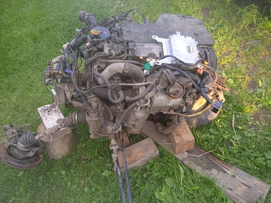 Продається мотор й коробка  мазда 323f 2.0 TDі  2002 рік з проводкою