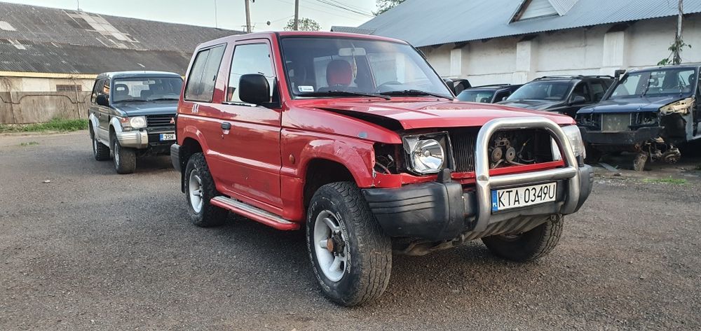 Розборка Mitsubishi Pajero 2. 2.5 дизель мотор роздатка полуось супорт