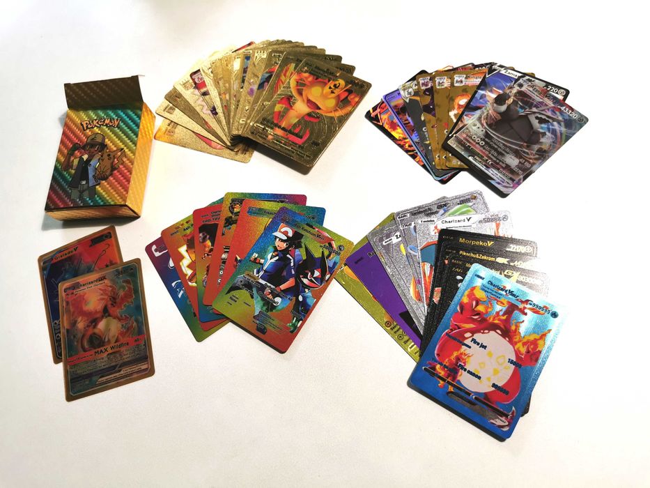 Karty Pokemon 290szt. w tym złote, holo + 2 albumy + zł. pudełko +3kod