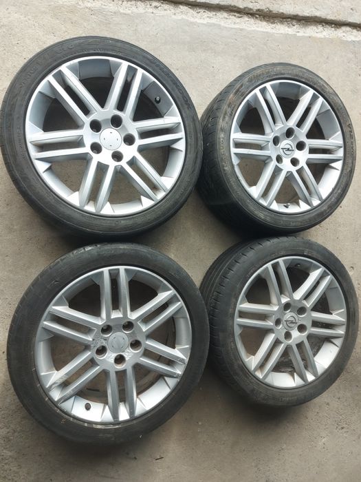 Диски литі Опель 5×110 7J×17H2 ET41 шини 215/45