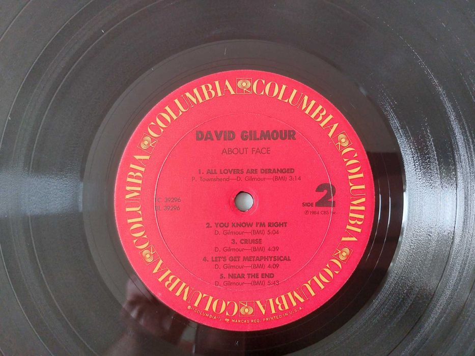 Продам виниловую пластинку David Gilmour 1984 About Face