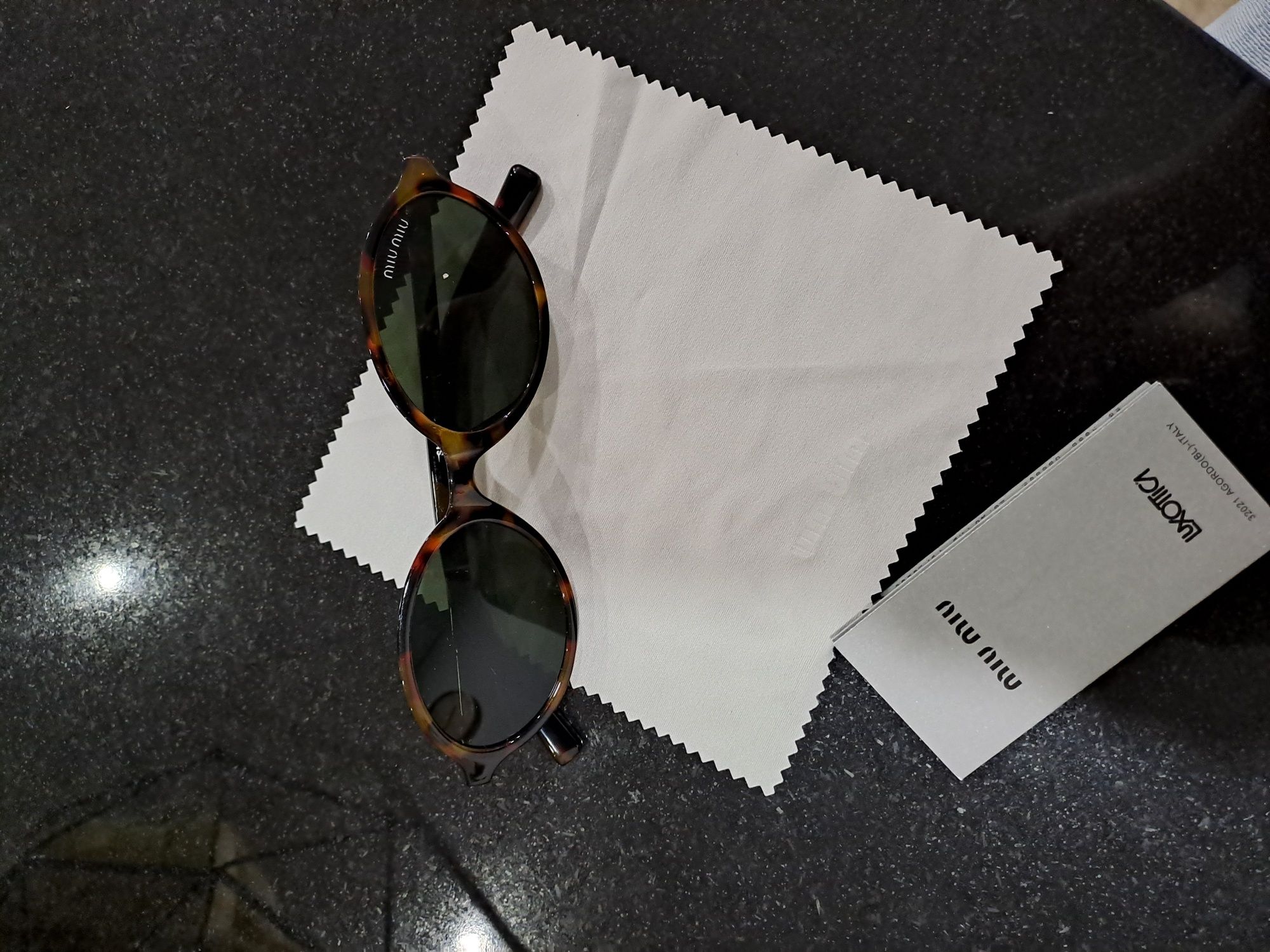 Óculos de sol novos