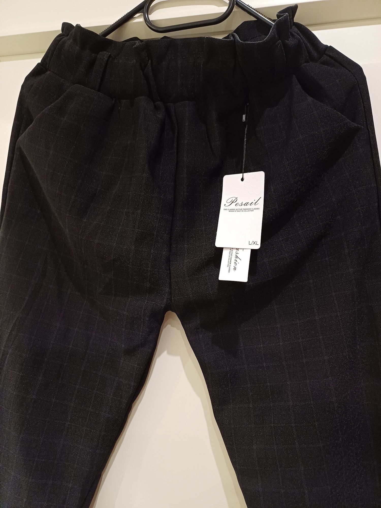 Eleganckie spodnie w kratkę