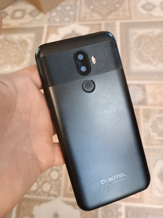 Oukitel U18 4/64Gb Black не заряжается
