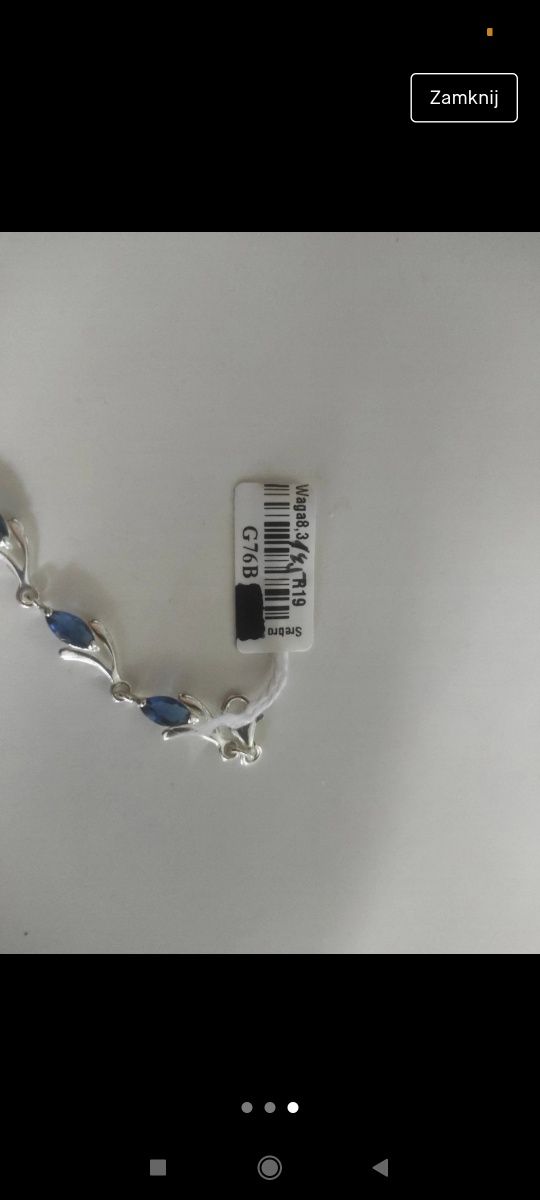 Srebrna bransoletka z niebieskimi dodatkami