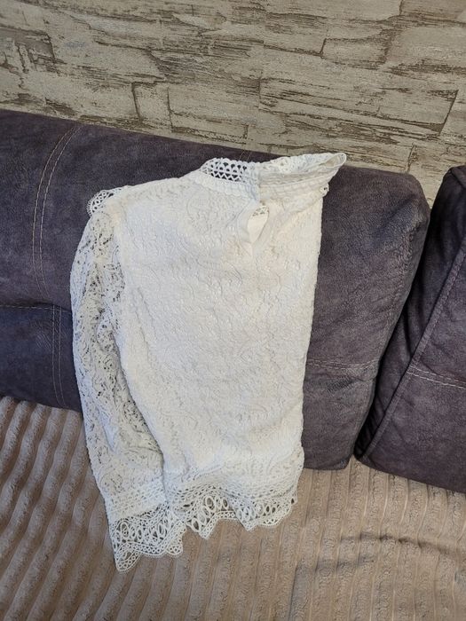 Біла ажурна блузка-кофта