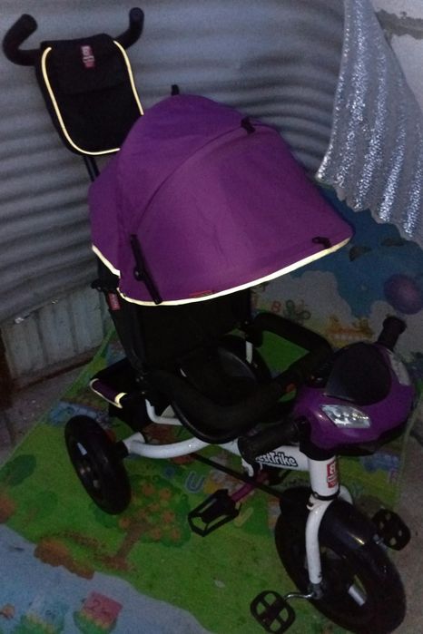 Продам детский музыкальный  велосипед-коляска Best Trike почти новый.