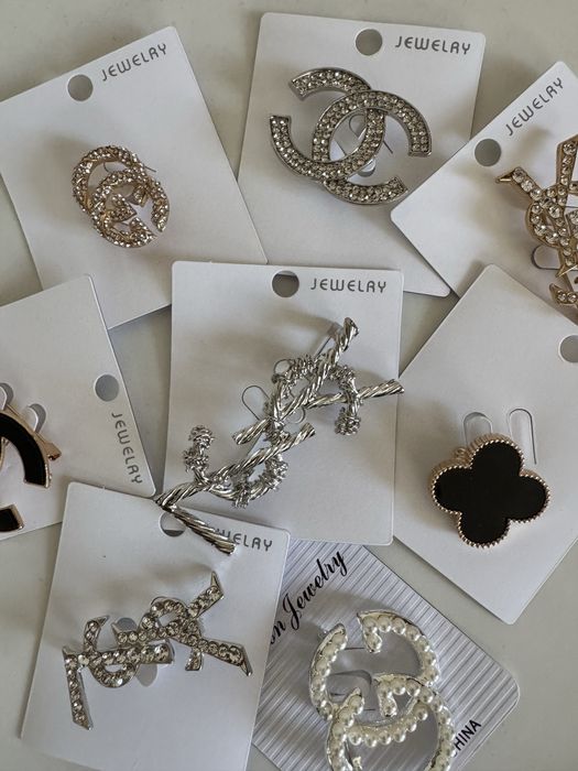 Брошки брендові