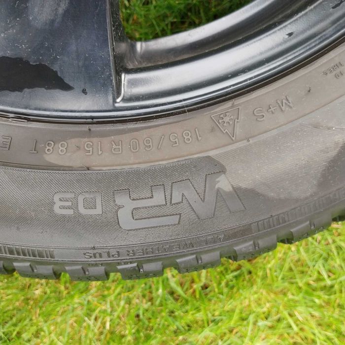 Koła zimowe 5x100 185/60/15 alufelgi czarne Dezent opon Nokian VW polo