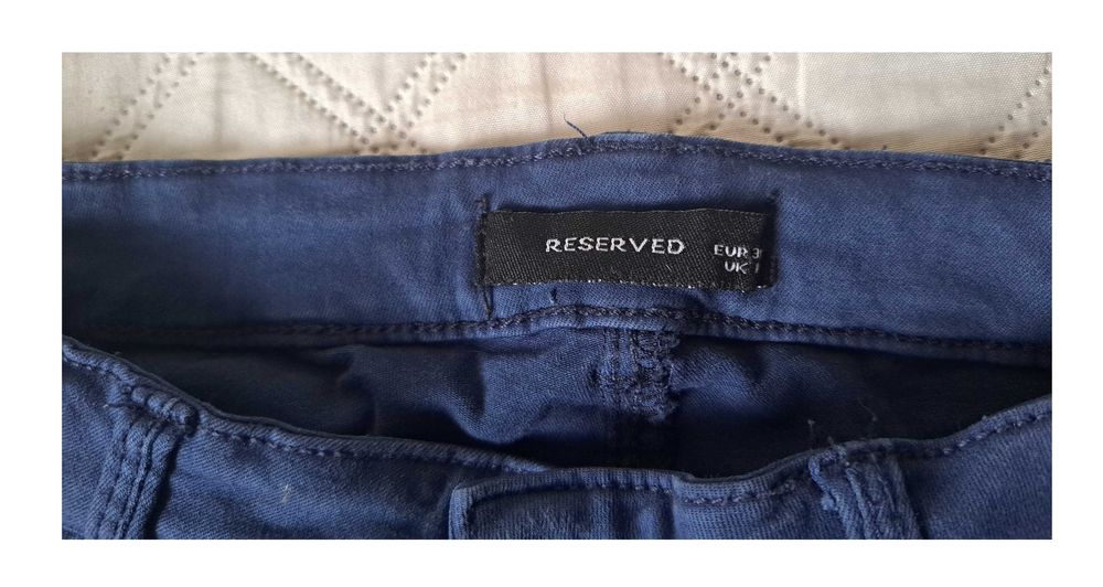 Granatowe spodnie z wysokim stanem Reserved