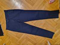 Granatowe spodnie Reserved rozm 32