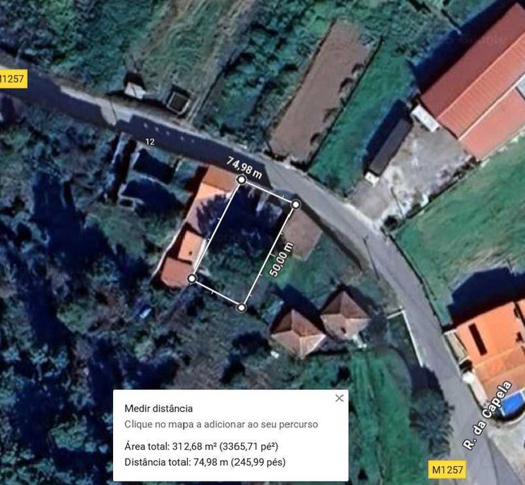 Casa rústica em ruínas e terreno na localidade Vessadios - Andrães.