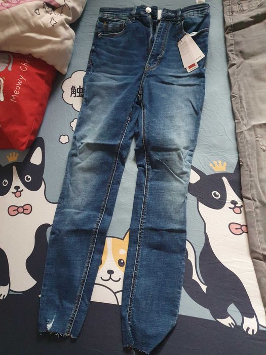 Spodnie markowe stradivarius  rozmiar 40