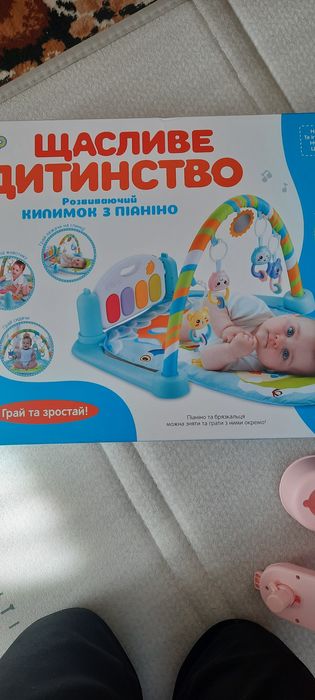 Продам розвиваючий килимок стан НОВОЇ іграшки