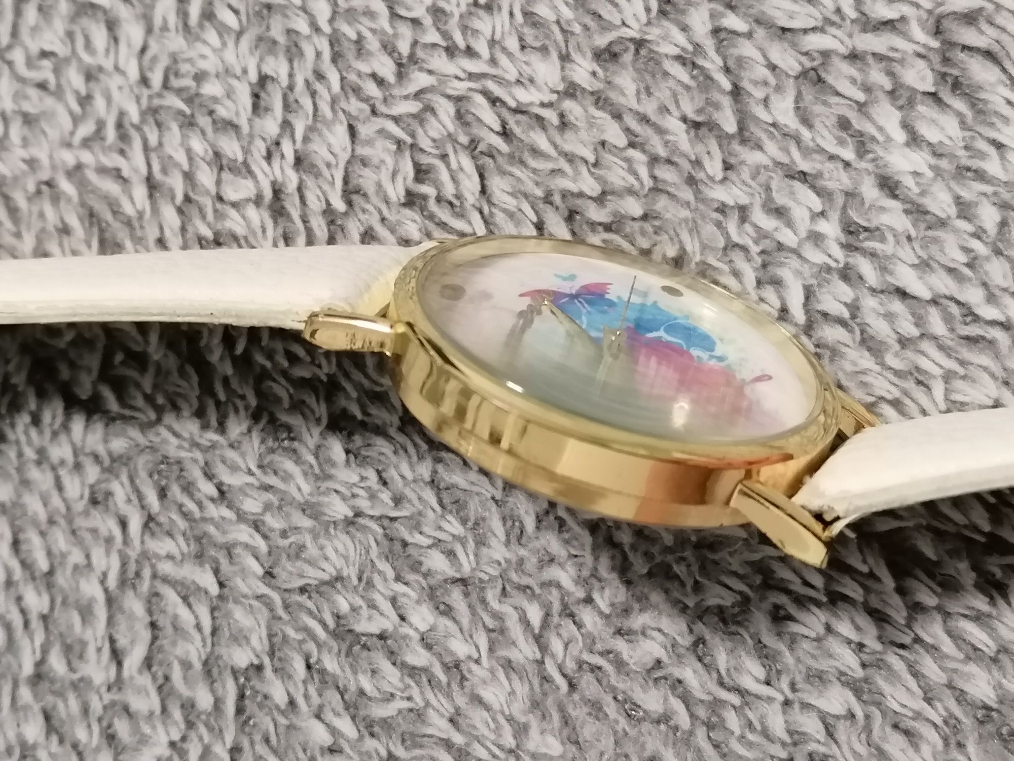 Damski zegarek Geneva z motywem kolorowych motyli