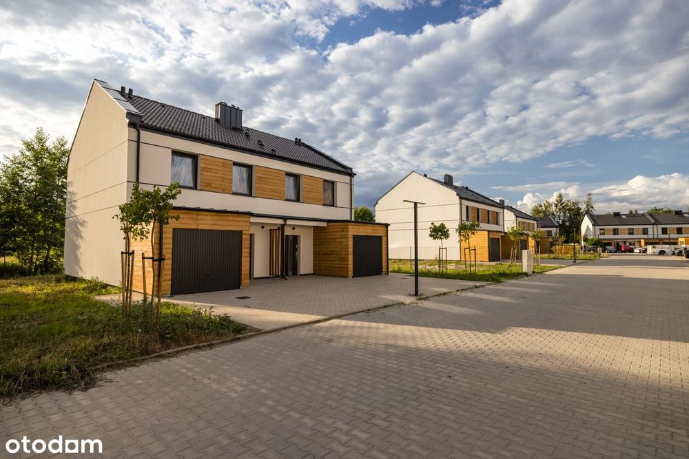 Dom w zabudowie bliźniaczej z garażem w Czmoniu