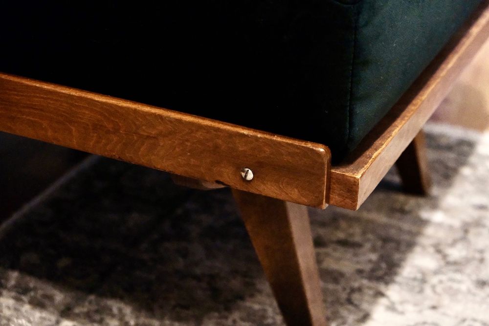 Sofa Tatra Nábytok z podnóżkiem | PRL, butelkowa zieleń, po renowacji