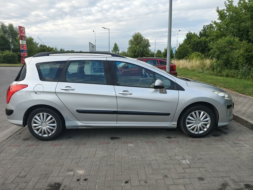 Peugeot 308SW 2009r. 1.4B 95KM 70kW