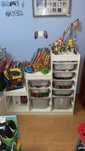 Móvel de arrumação de brinquedos