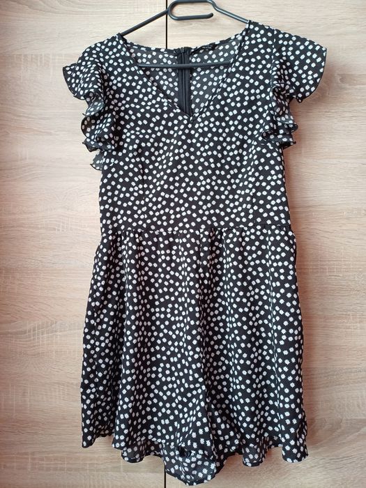 Czarny kombinezon w kwiatuszki, rozmiar S