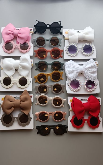 Окуляри дитячі сонцезахисні, пов'язки дитячі.