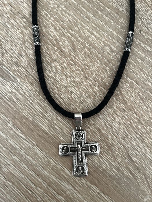 Срібний хрест на шовковому шнурку з вставками