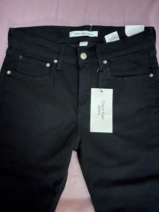 Wyprzedaż spodnie męskie Calvin Klein Jeans.