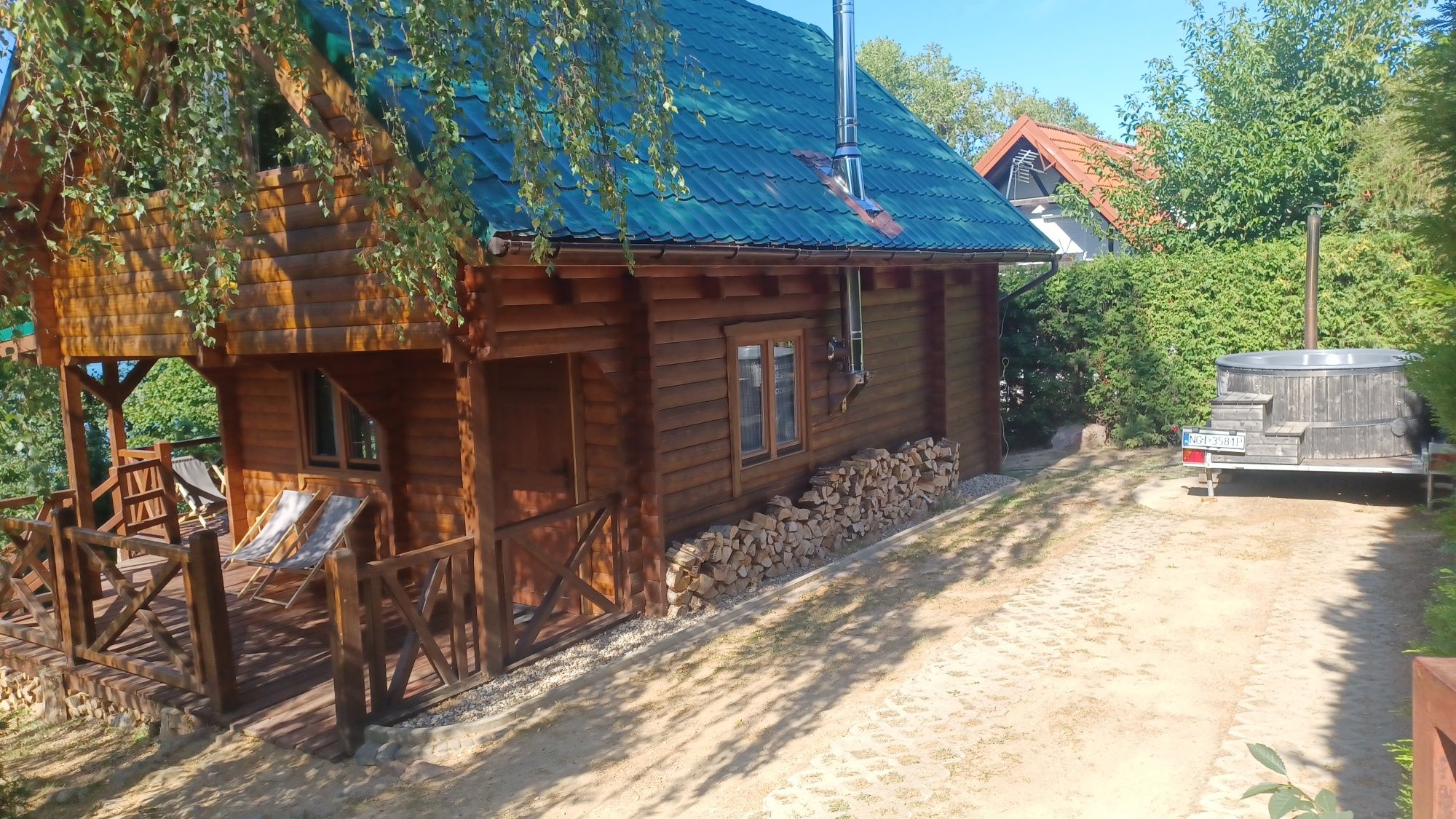 Domek nad jeziorem  na Mazurach Caloroczny Kominek linia brzegowa