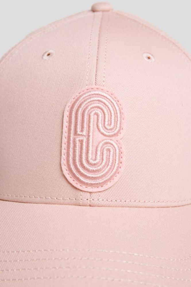 COACH Рожева бавовняна шапка з логотипом