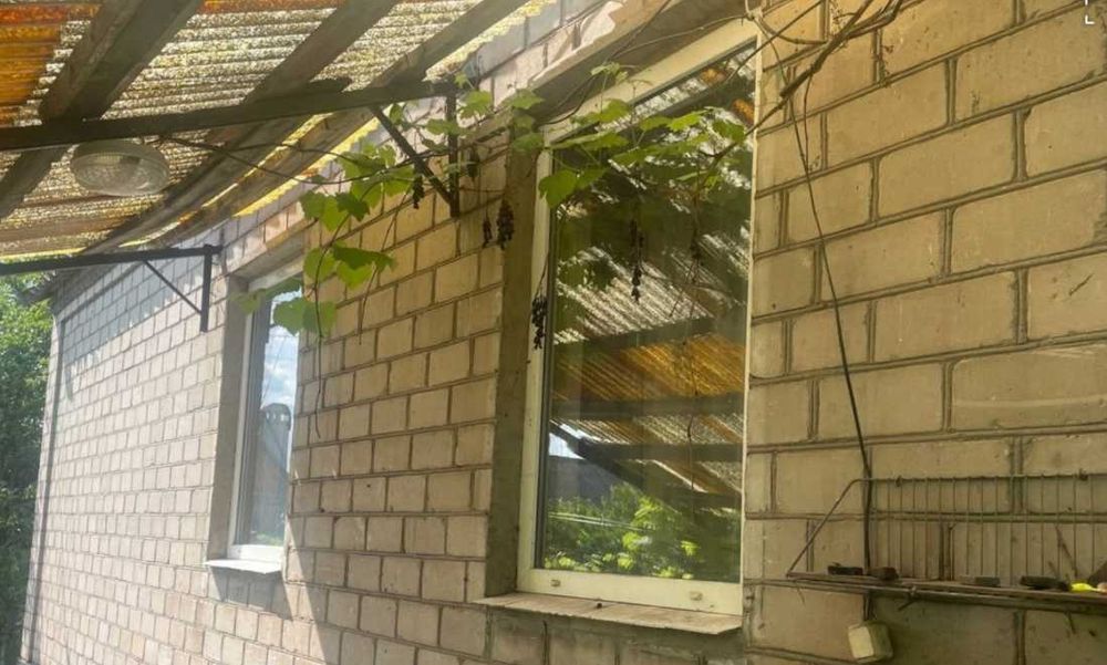 Продам кирпичный Дом на поселке  Строителей в городе Каменское.