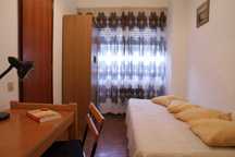 Quarto com casa de banho privativa