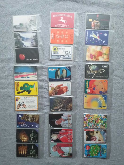 Stare karty telefoniczne polskie i zagraniczne - 147 szt.