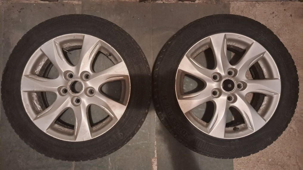 4 używane alufelgi 16" Mazda (i inne) z oponami zimowymi Continental 2