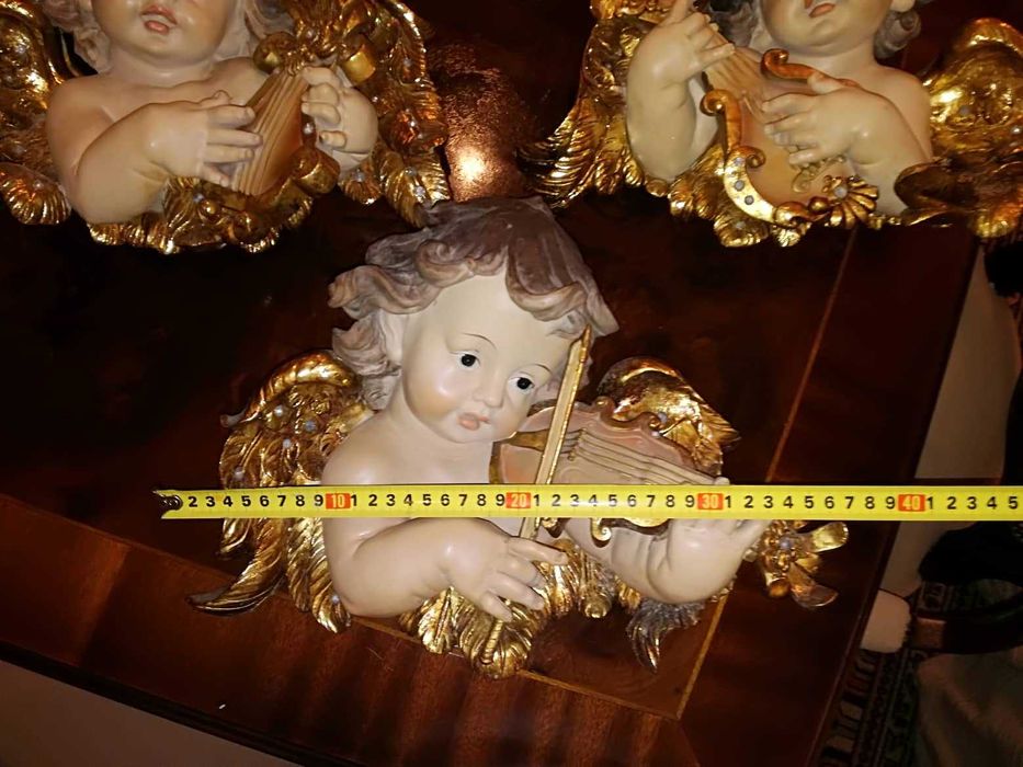 Anjos de parede decorativos