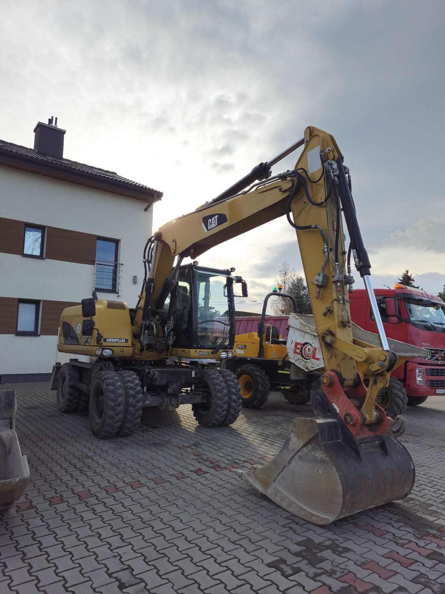 KOPARKA KOŁOWA marki CAT TYP M313D  150zł/h