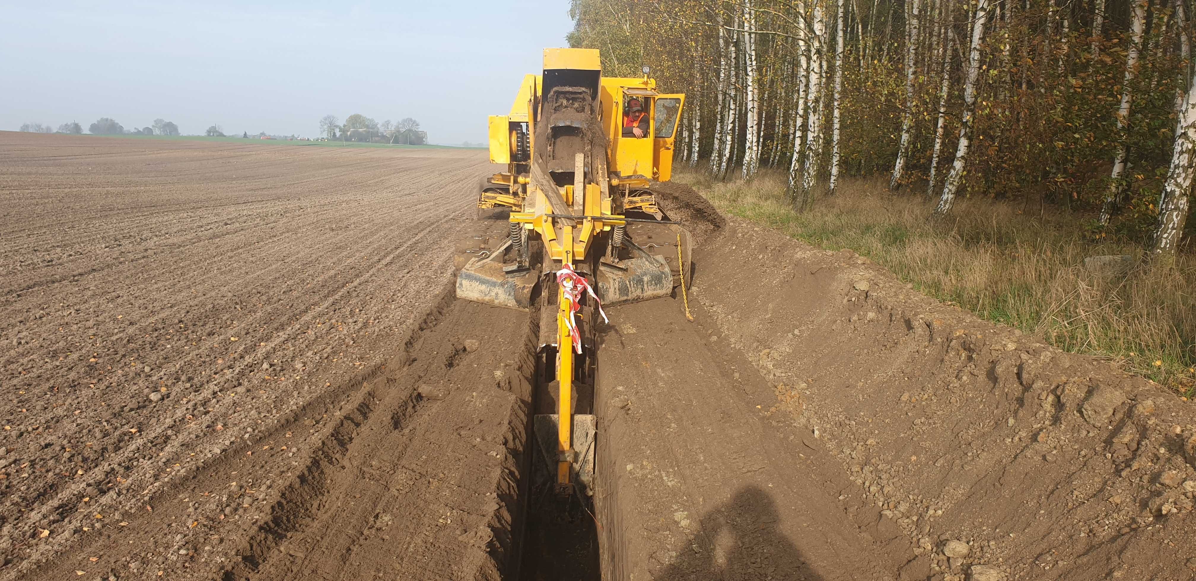 Usługi koparką łańcuchową wykopy liniowe, gaz prąd woda drenaż