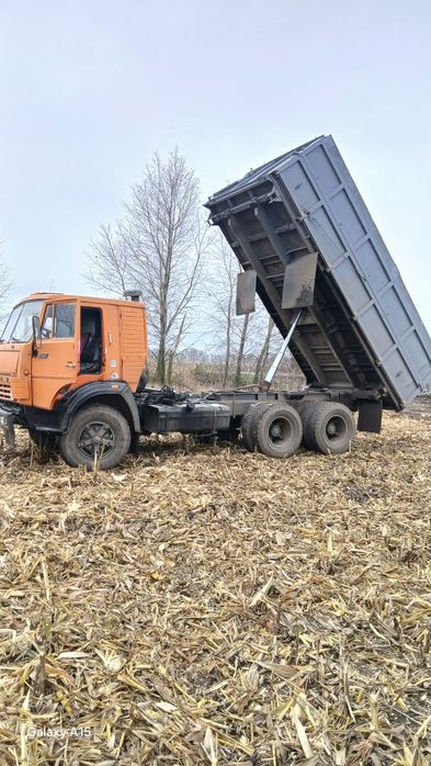Камаз самосвал  на три сторони.