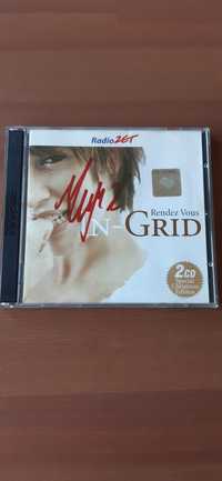 Płyta 2xCD In-Grid z autografem.