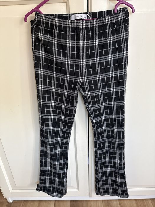 Legginsy typu dzwony w kratke 140 cm reserved