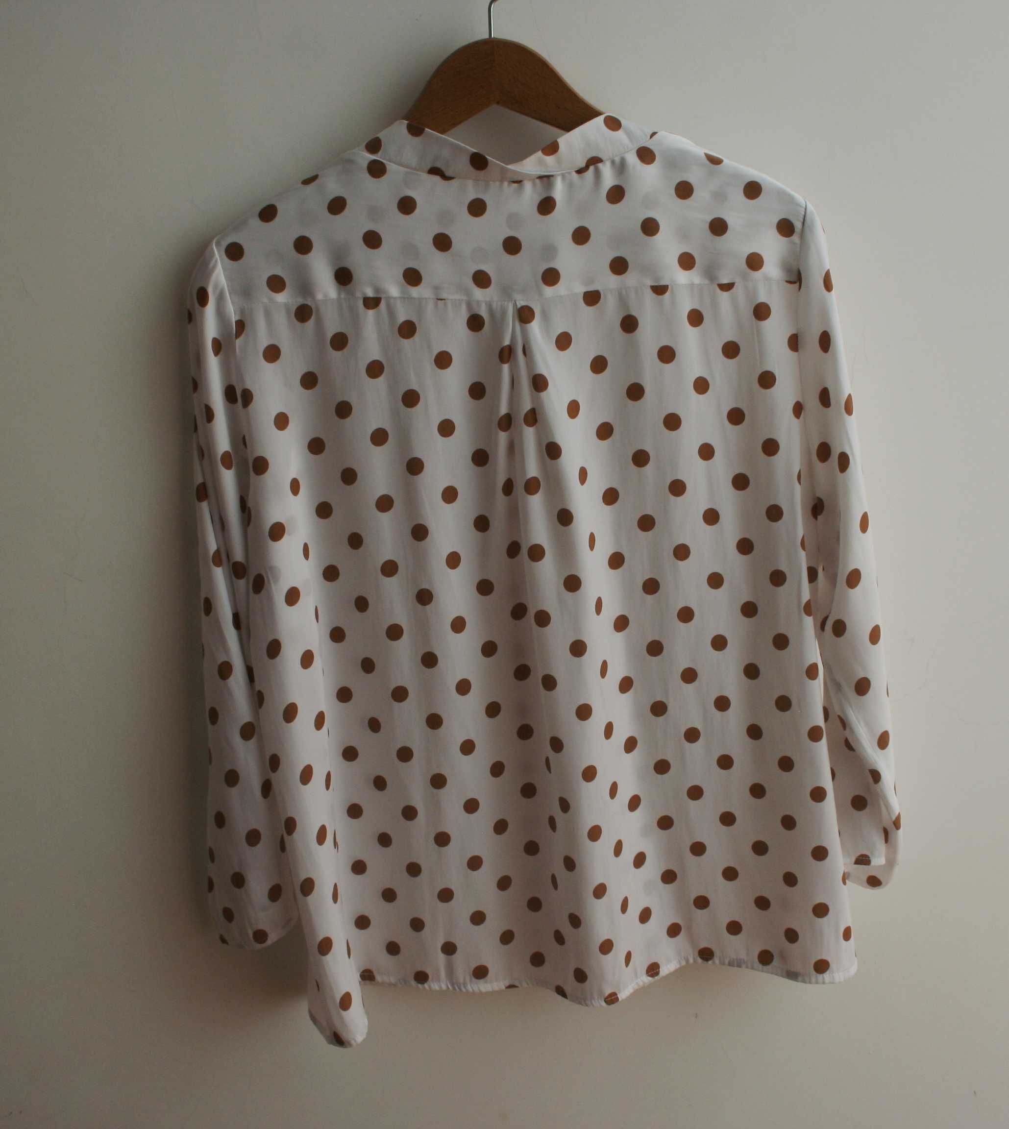 Blusa com bolas Sfera