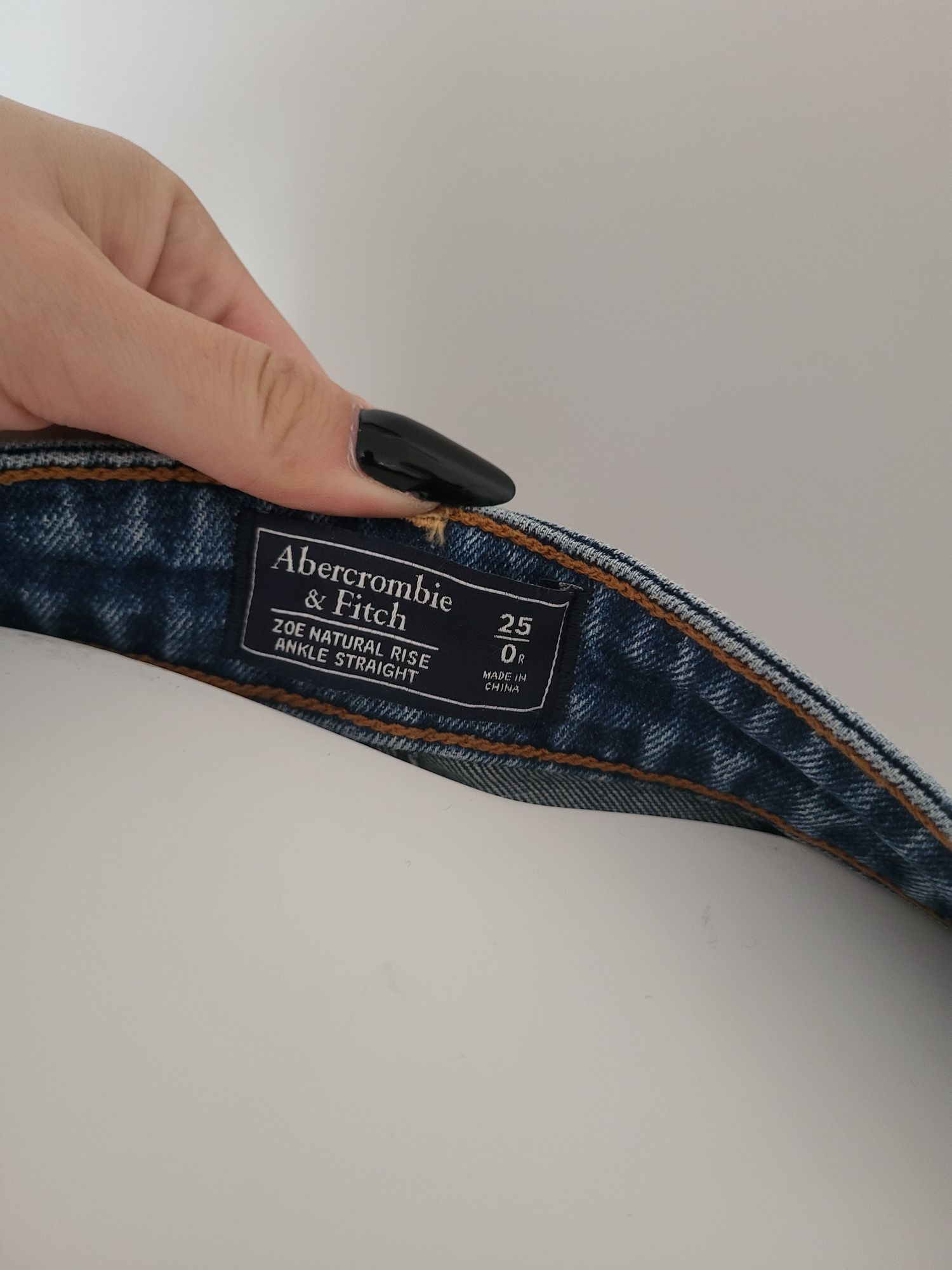 Ciemne niebieskie jeansy z wysokim stanem dziurami przetarciami 34 XS