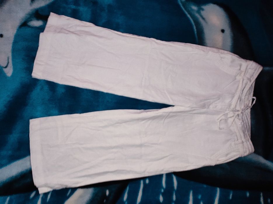 Białe spodnie typ 3/4 marki Next r. 36 S/M