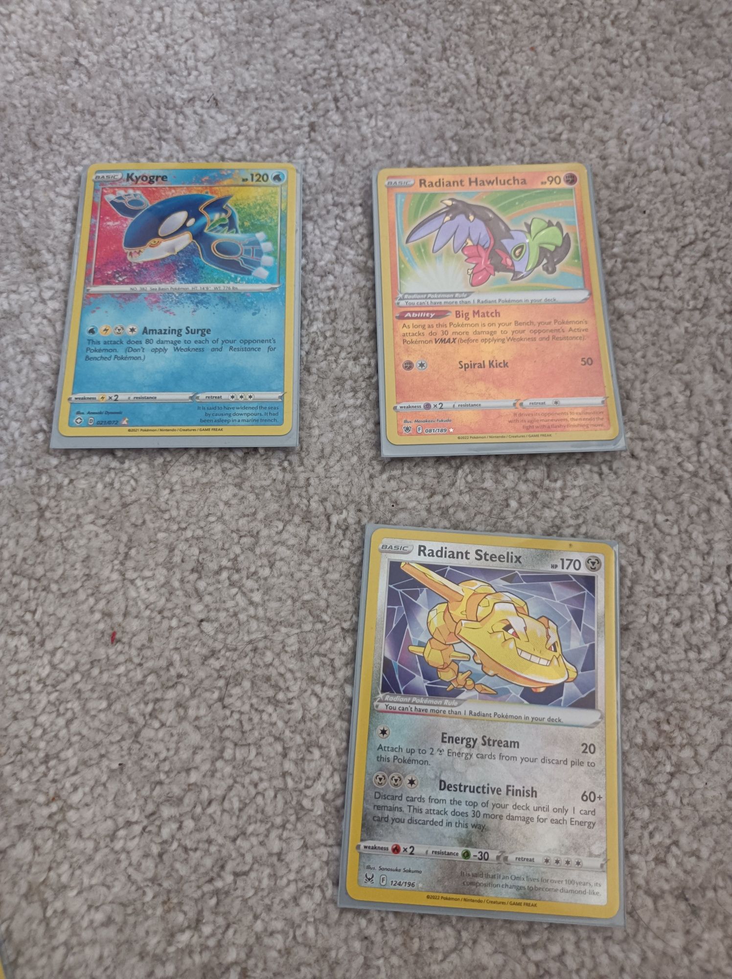 Radiant hawlucha, radiant steelix i kyogre rainbow