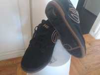 Tenis com rodas. unissexo.