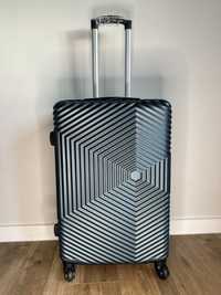 Nowa walizka średnia -  bagaż do 23 kg